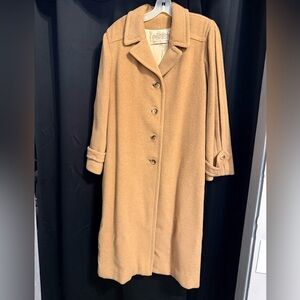 Vintage women's  100% Camel hair long coat. Tan in color silk liner size medium